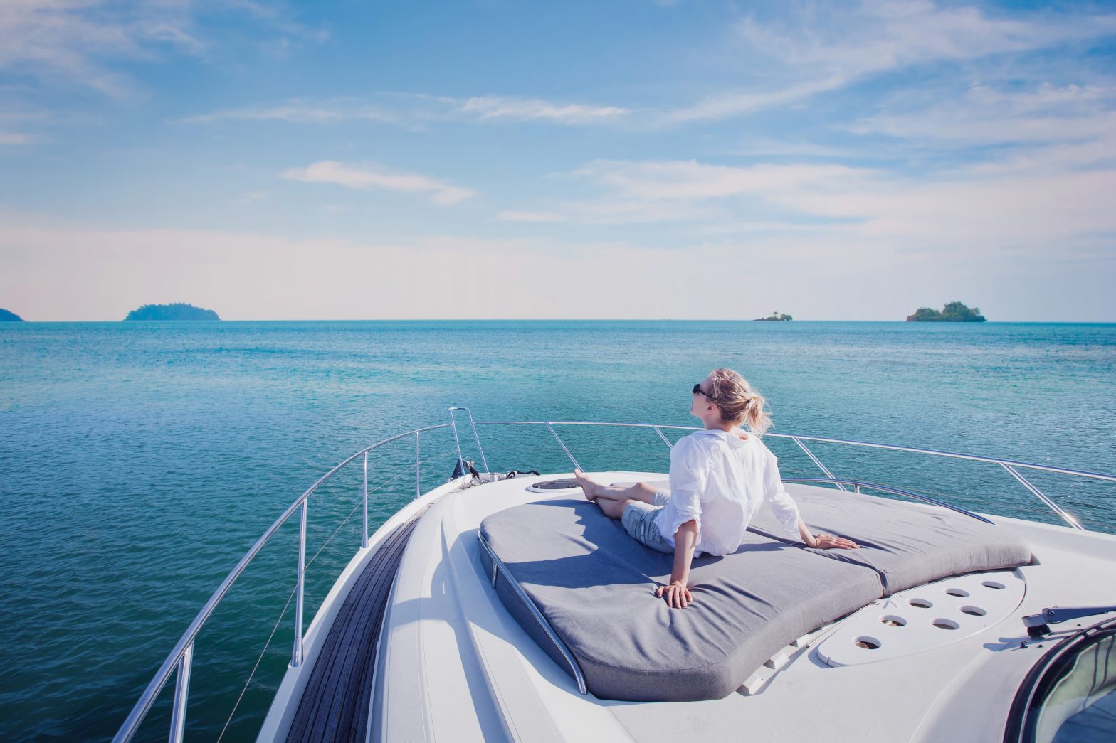 Woman Relaxing on the deck of a luxury boat