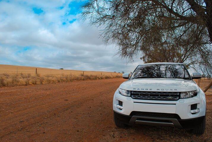 White 4wd on site of the road in the Barossa Valley