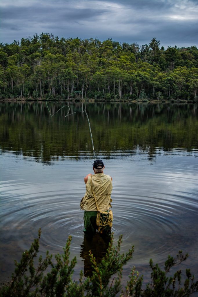 Man wade fishing in a local lake